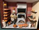 Diorama einer historischen Backstube mit B&auml;cker und Backwaren